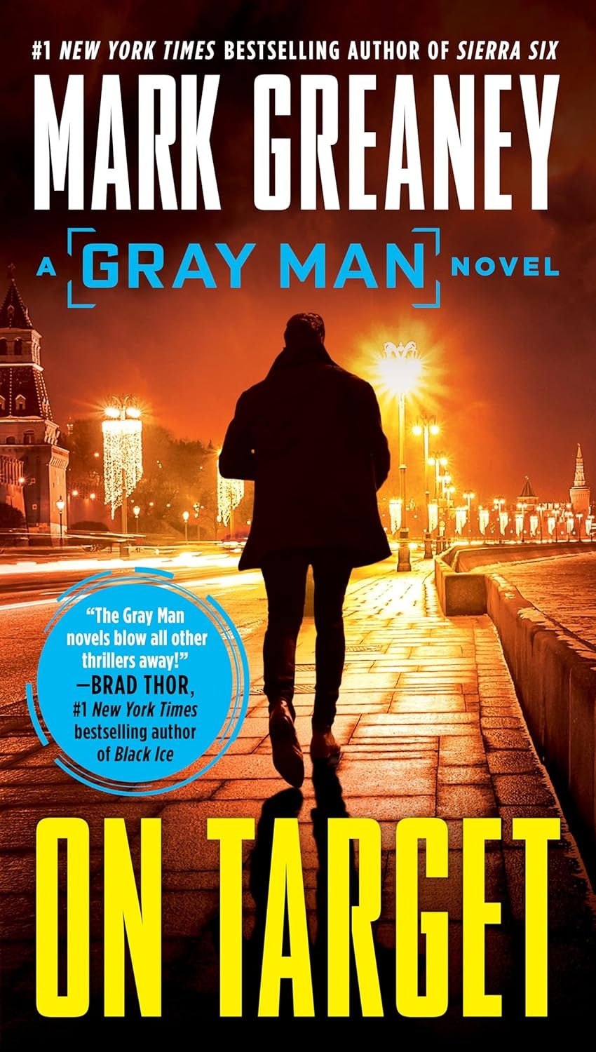Book cover: "On Target" by Mark Greaney, featuring a silhouette walking on a lit street, part of the Gray Man series.