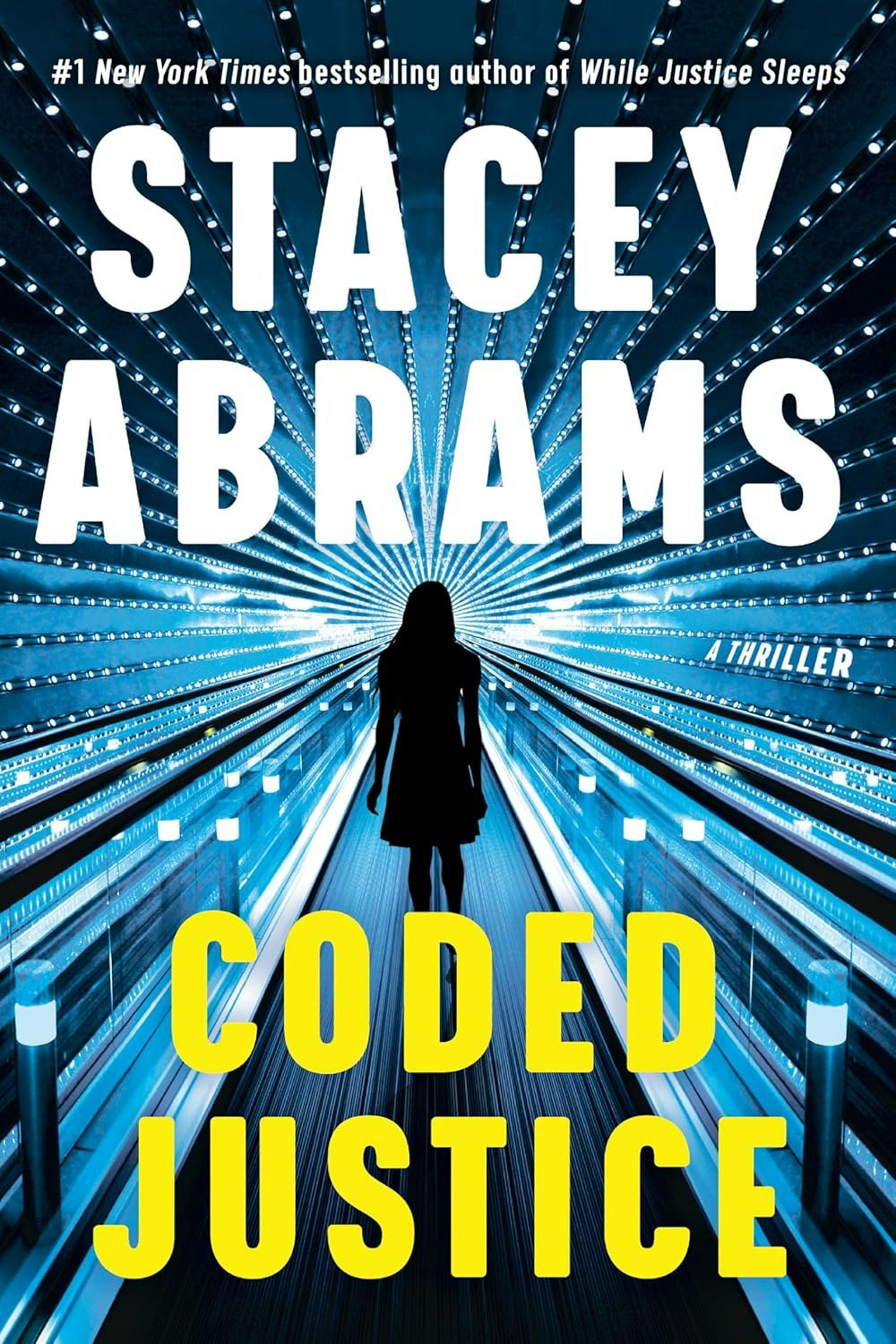 Book cover: "Coded Justice" by Stacey Abrams. Silhouette of a woman on a futuristic blue walkway with light beams.