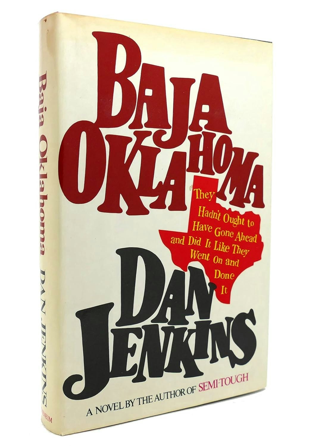Book cover of "Baja Oklahoma" by Dan Jenkins, featuring bold red and black text on a white background.