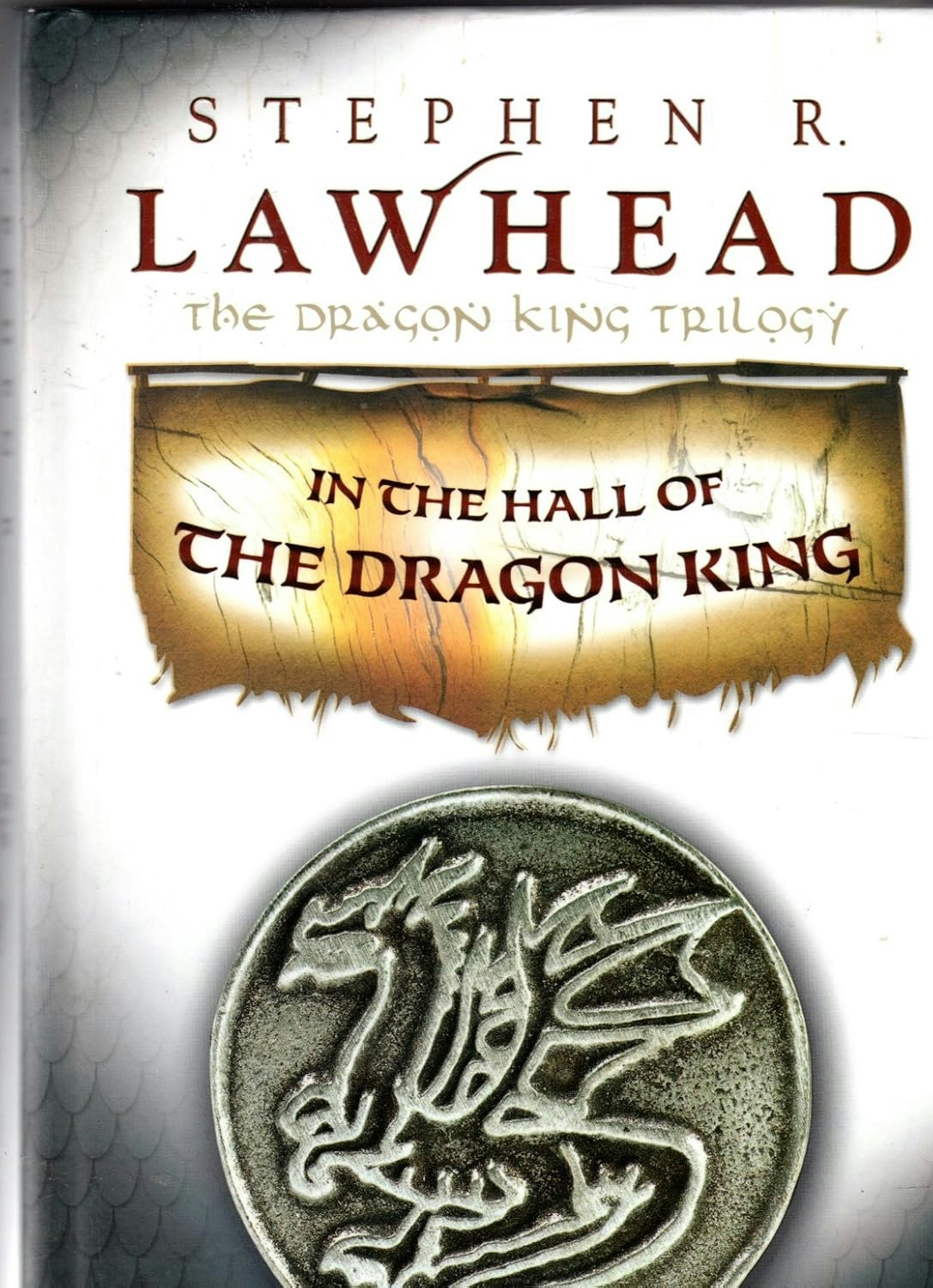 The image features the book cover of "In the Hall of the Dragon King" by Stephen R. Lawhead, part of the Dragon King Trilogy.