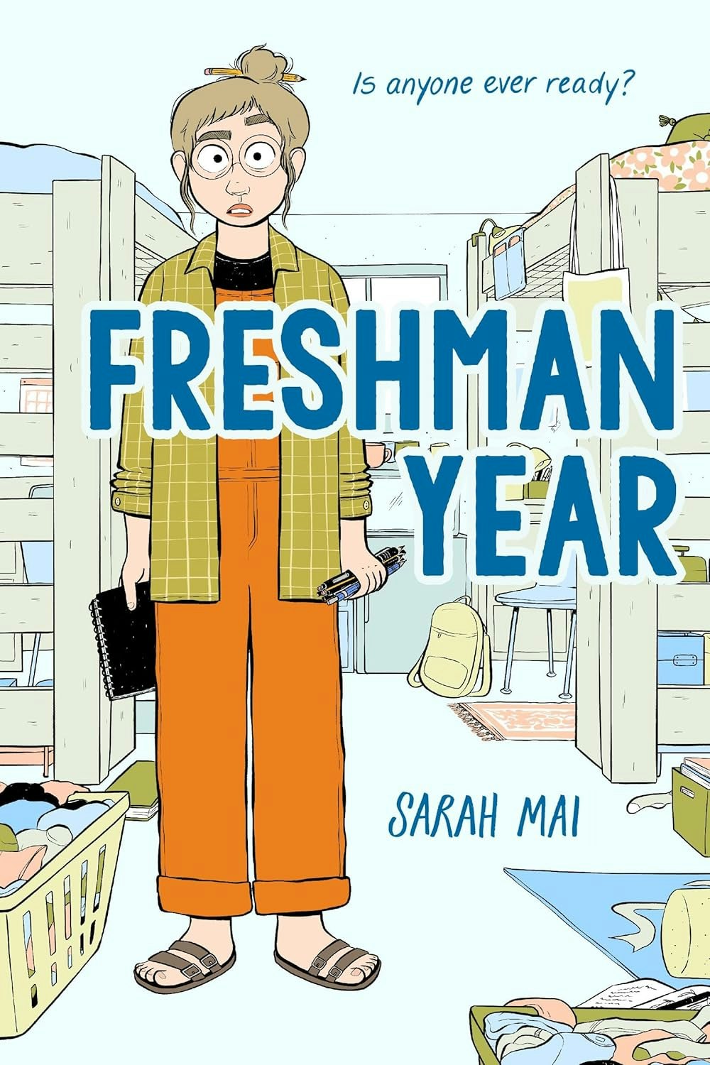 Illustrated book cover: "Freshman Year" by Sarah Mai. A student stands in a cluttered dorm room, looking surprised.