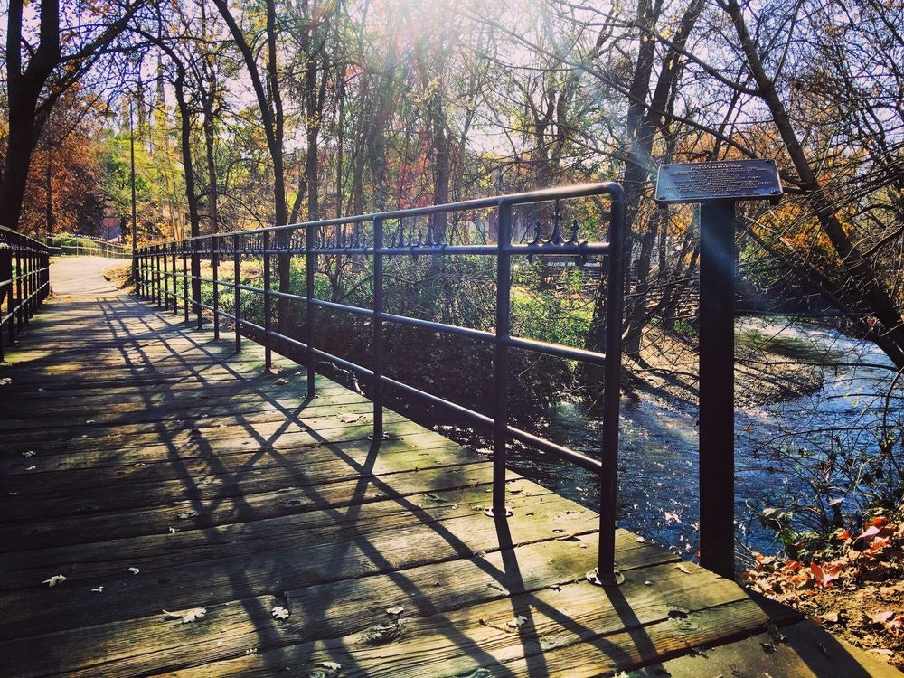 May contain: railing, banister, handrail, path, building, bridge, and boardwalk