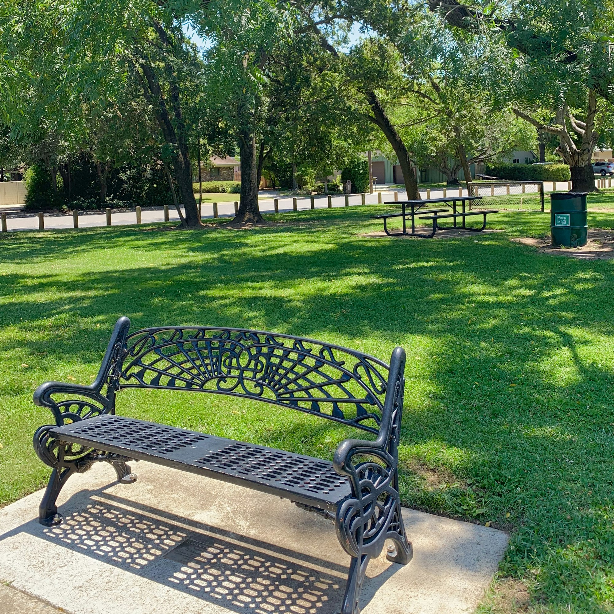 May contain: furniture, plant, grass, bench, and park bench