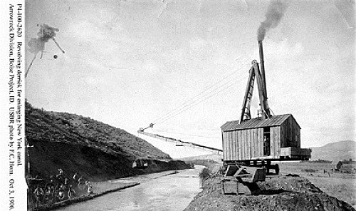 Old Photograph of a building near a river