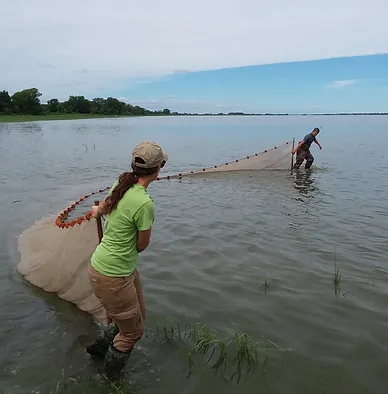May contain: fishing, leisure activities, outdoors, water, and person