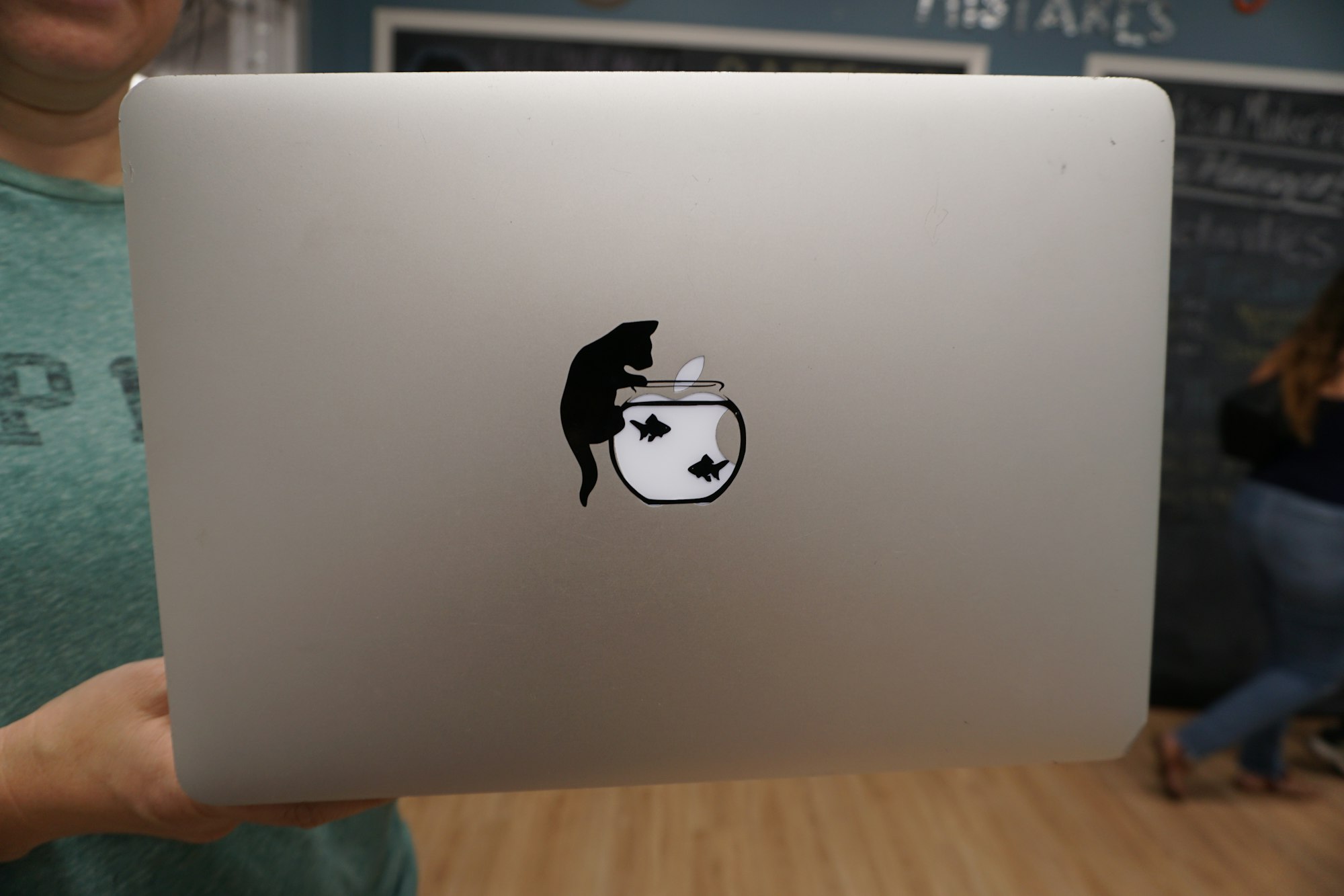 May contain: computer, electronics, laptop, pc, adult, female, person, woman, and logo