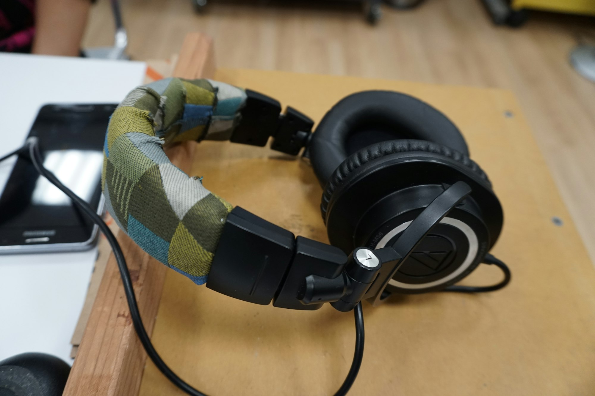May contain: electronics and headphones