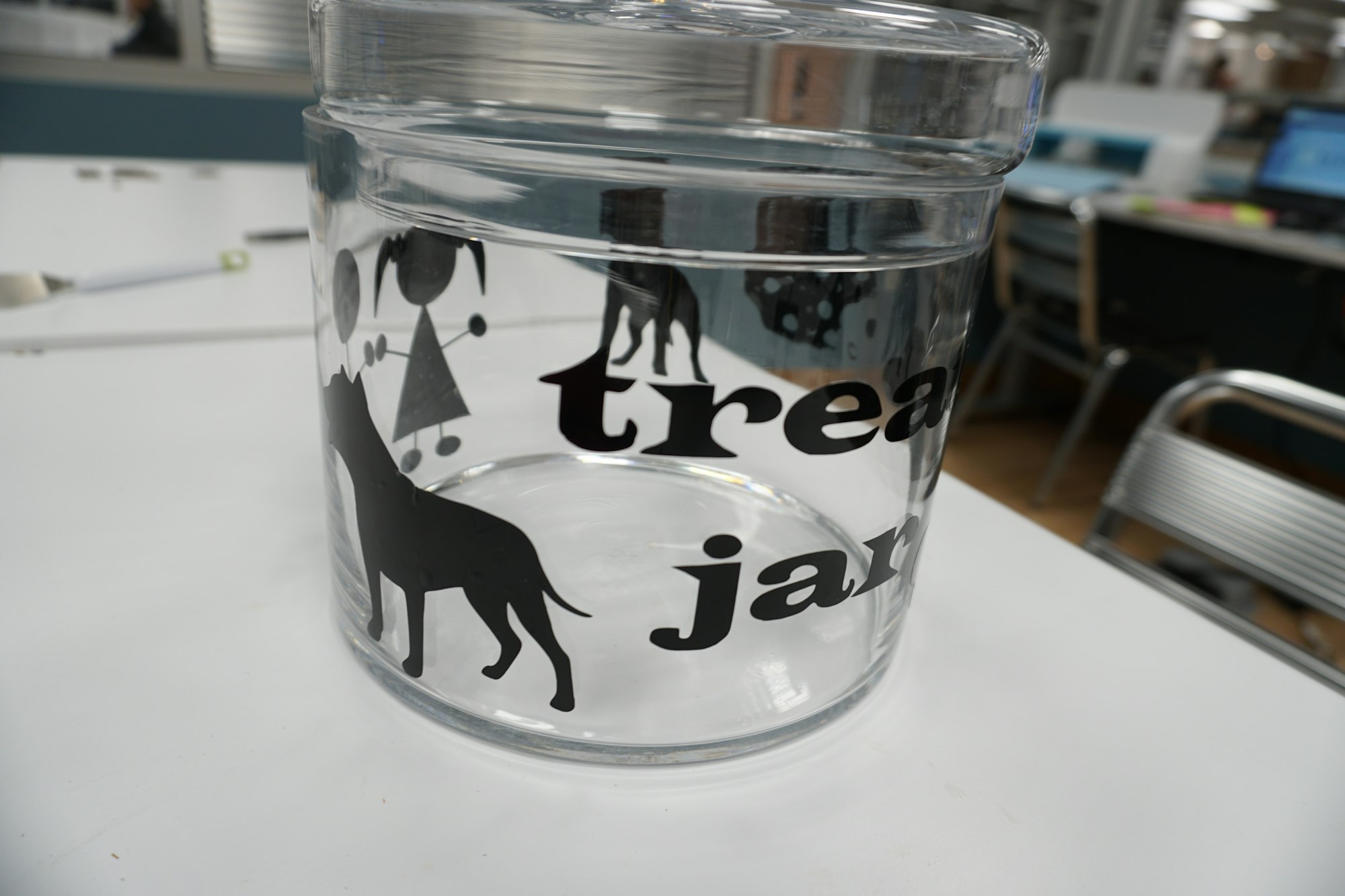 May contain: jar, chair, furniture, and cup