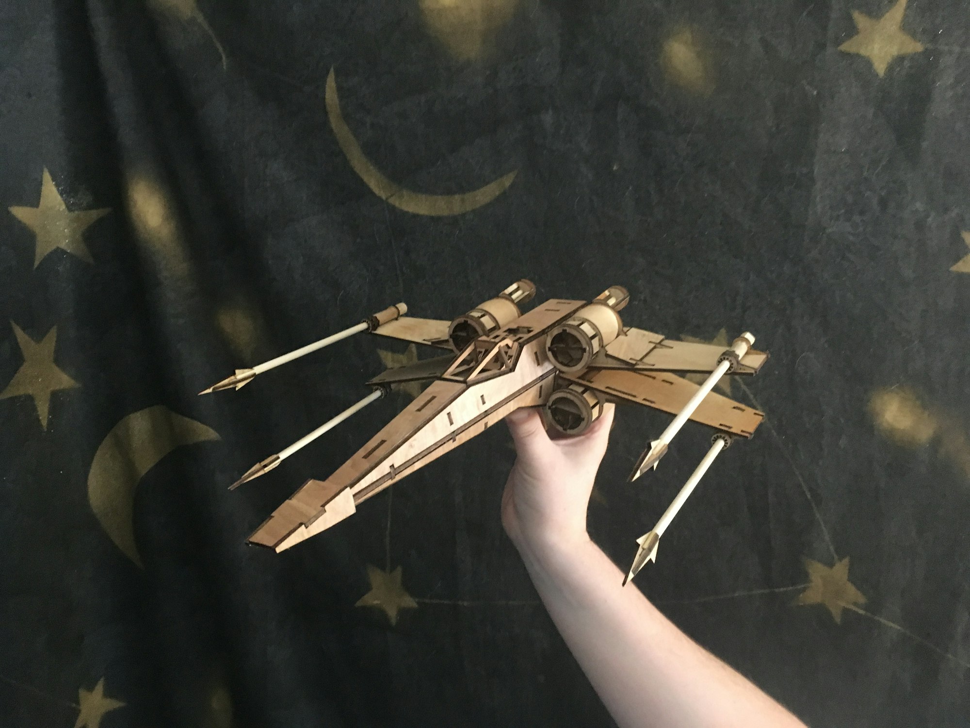 May contain: gun, weapon, arrow, and wood