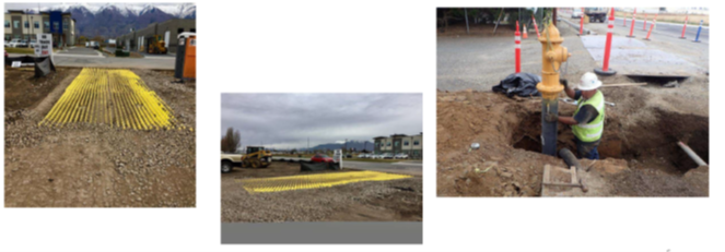 Construction work with tactile paving being installed and a worker in a trench.