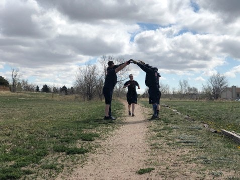 May contain: path, person, human, grass, plant, outdoors, walking, trail, nature, clothing, apparel, and vegetation