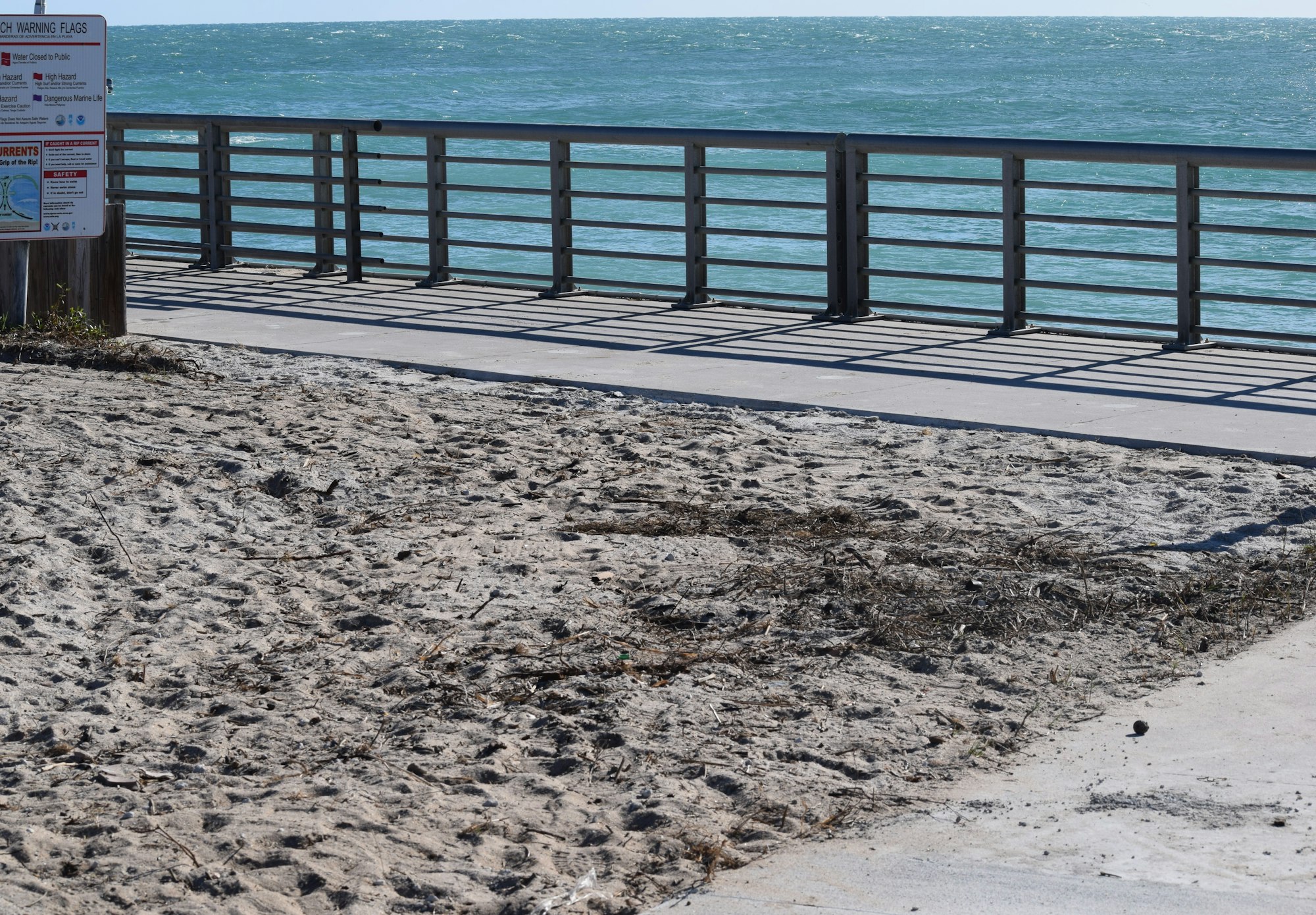 May contain: railing, waterfront, water, handrail, boardwalk, bridge, and pier