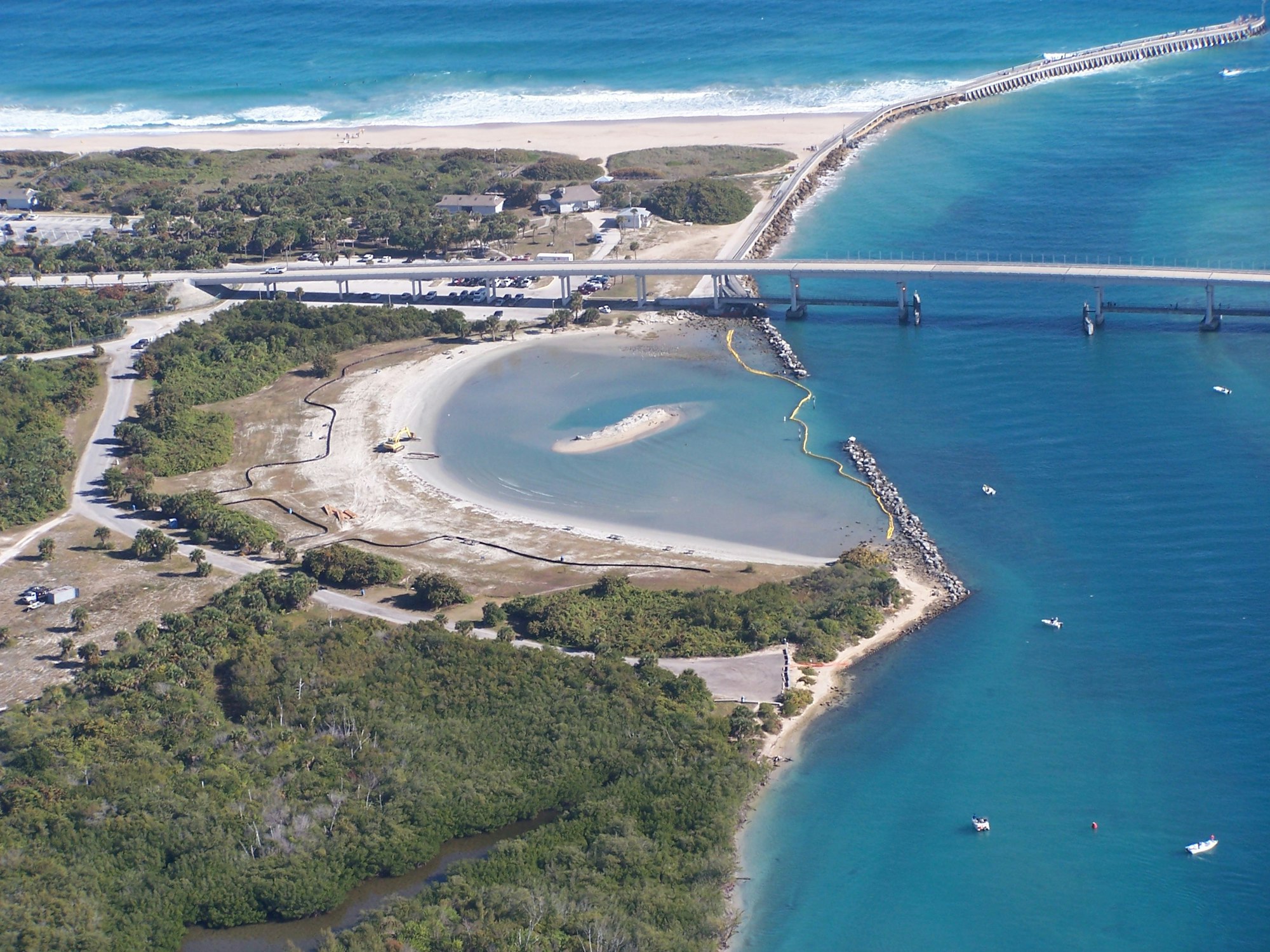 aerial view of tide pool at Sebastian Inlet looking East showing a portion of the channel on the right