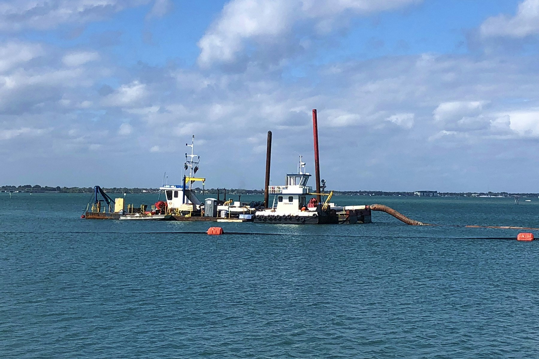 photo of dredge "Lori Hill" on the Sebastian Inlet flood shoal
