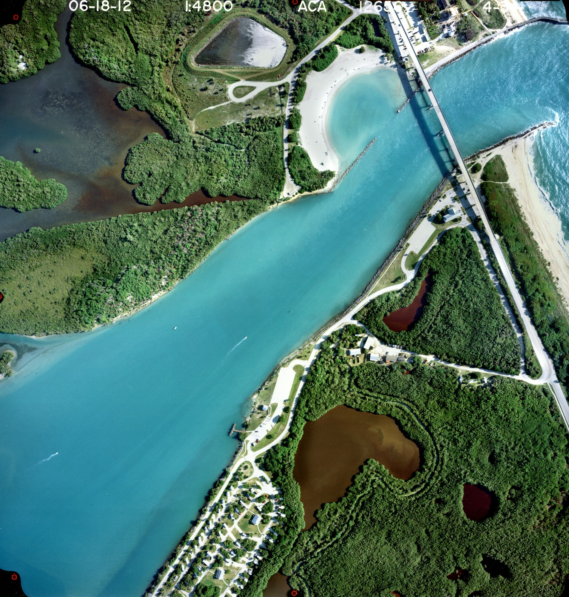 inlet aerial looking straight down showing inlet throat and channel with surrounding shorelines