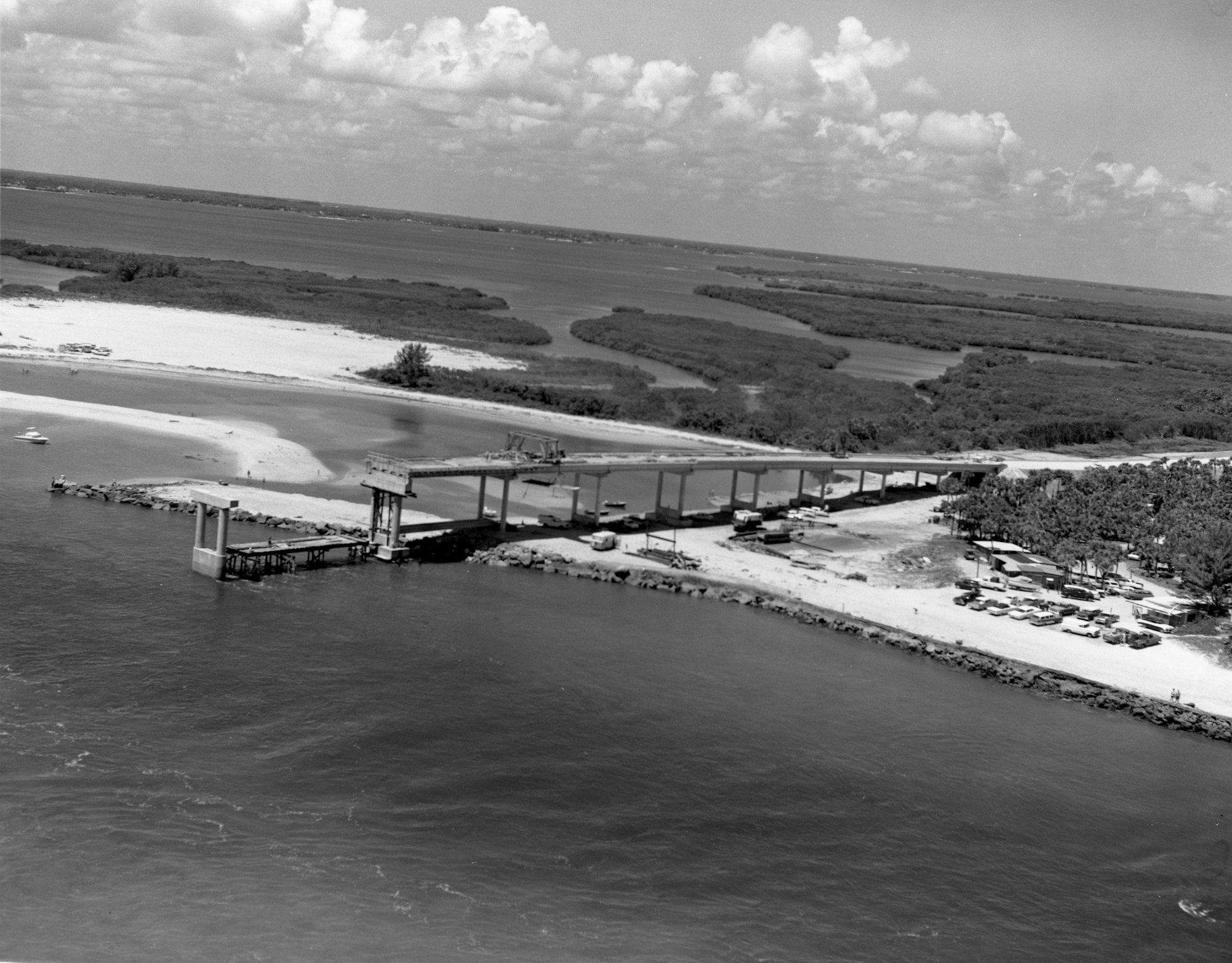 aerial view of construction of concrete support structures for bridge over Sebastian Inlet