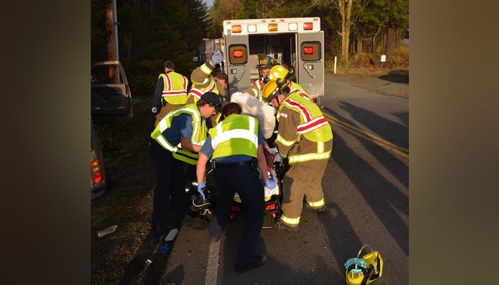 May contain: clothing, glove, footwear, shoe, helmet, person, hat, car, transportation, vehicle, adult, male, and man