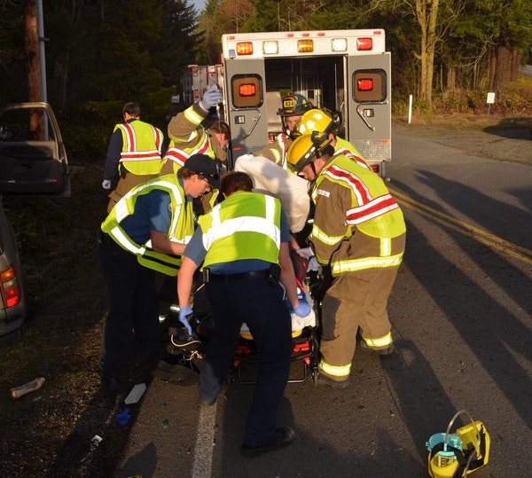 May contain: clothing, glove, footwear, shoe, helmet, person, hat, car, transportation, vehicle, adult, male, and man