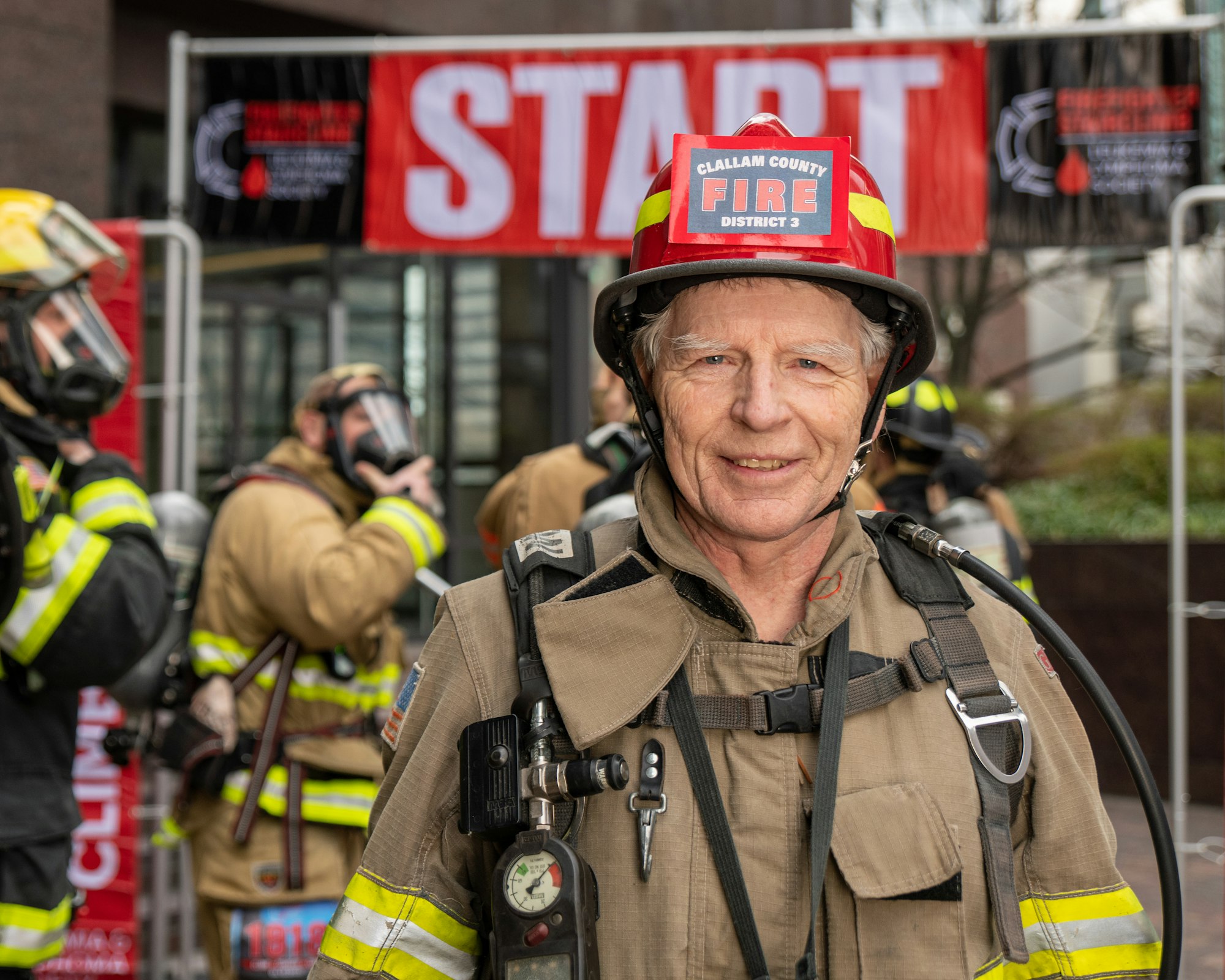 May contain: helmet, person, and fireman