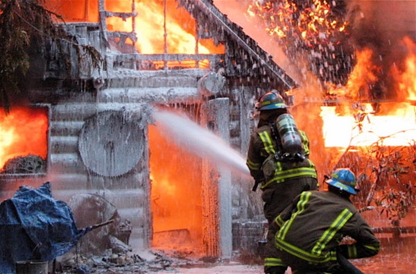 May contain: person and fire