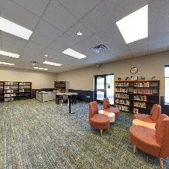 May contain: book, indoors, library, publication, room, waiting room, reception, reception room, chair, and furniture