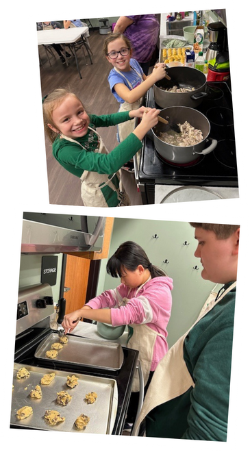 Children cooking in a kitchen, one stirring a pot and two placing dough on a baking sheet.