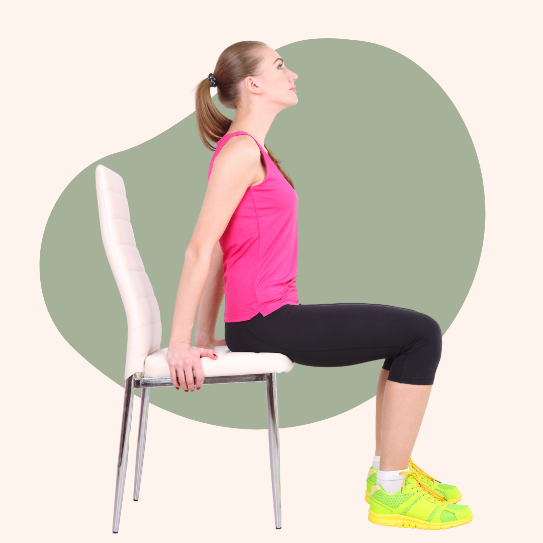 A woman in athletic wear is sitting on a chair, leaning back with hands on the seat, doing a tricep dip exercise.