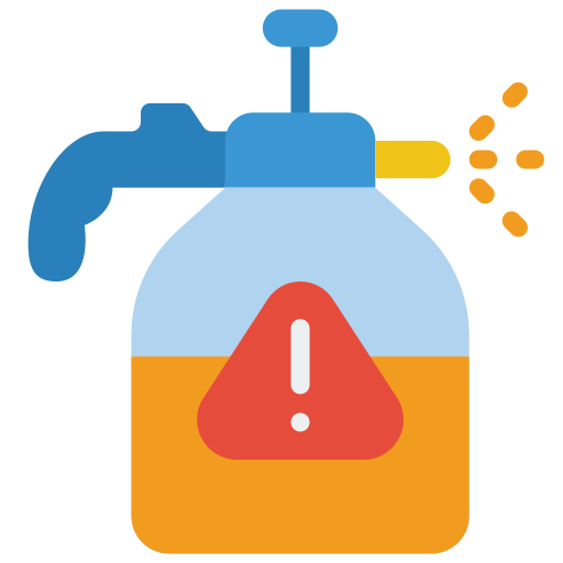 A spray bottle with a warning symbol and liquid inside.