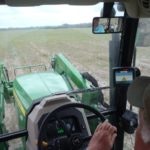 May contain: tractor, transportation, vehicle, device, grass, lawn, lawn mower, plant, and tool