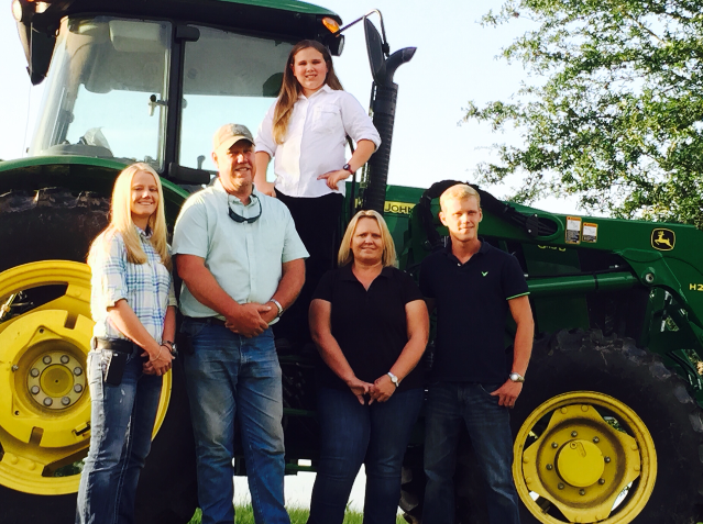 May contain: clothing, pants, adult, female, person, woman, people, tire, male, man, jeans, machine, wheel, alloy wheel, car, car wheel, spoke, transportation, and vehicle