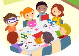 Children crafting masks around a table, using scissors, paper, and colors, smiling and creating art together.