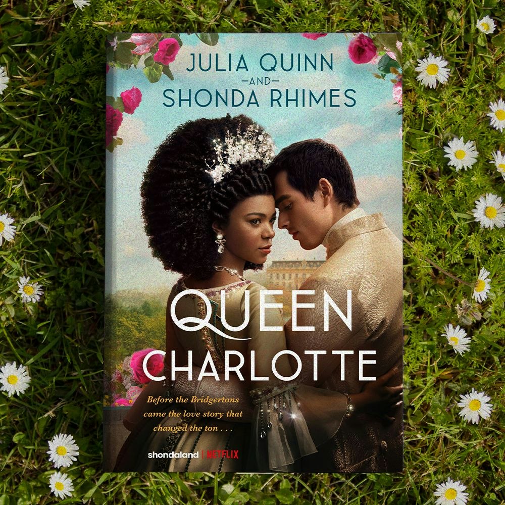 Book cover of "Queen Charlotte" by Julia Quinn and Shonda Rhimes, featuring a couple, flowers, and Netflix logo.