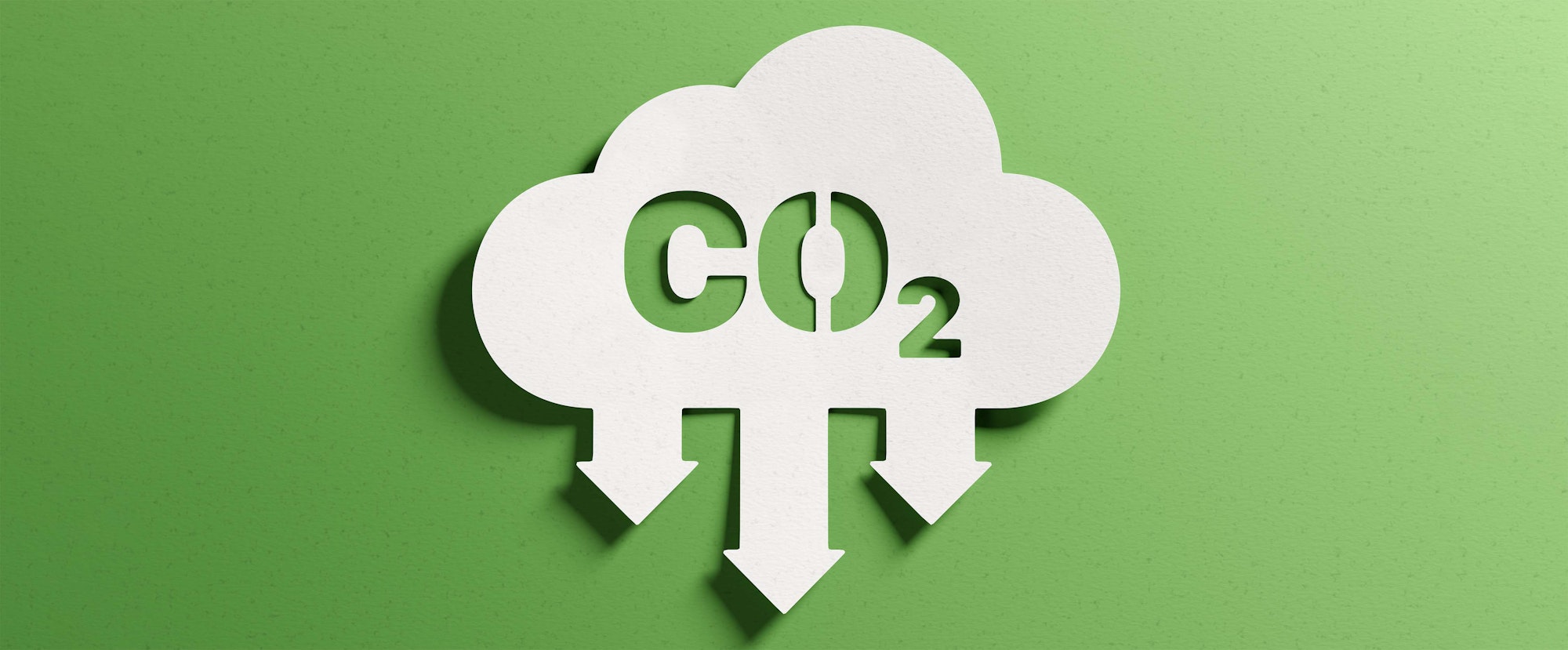 CO2 cloud icon with arrows pointing down, symbolizing carbon capture or reduction, on a green background.