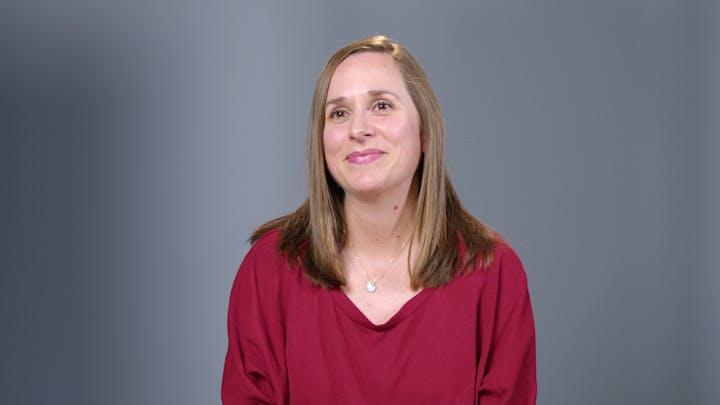 Smiling woman with red shirt
