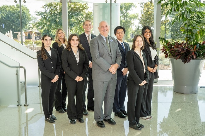 Chris Ailman and a group of student interns