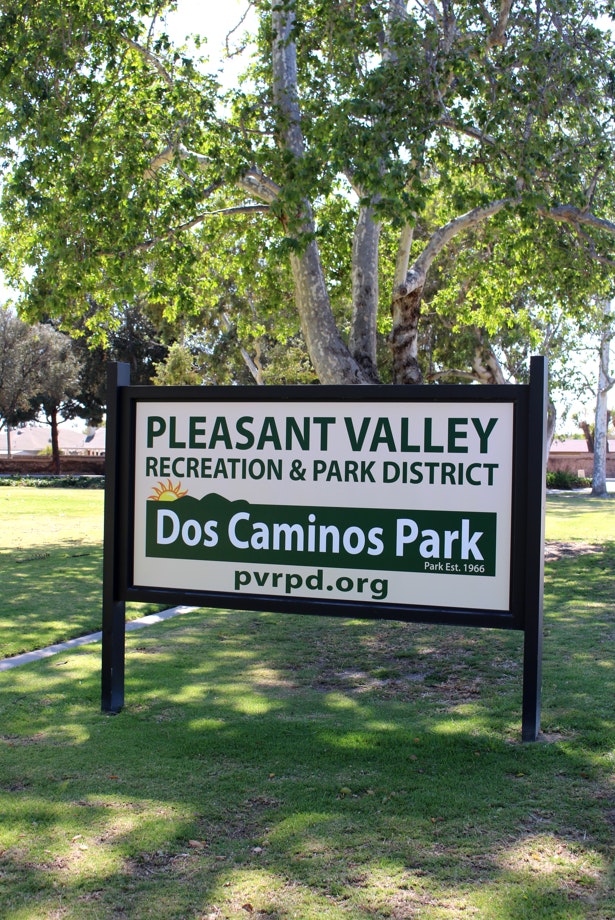 Dos Caminos Park sign