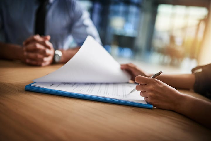Paperwork with pen