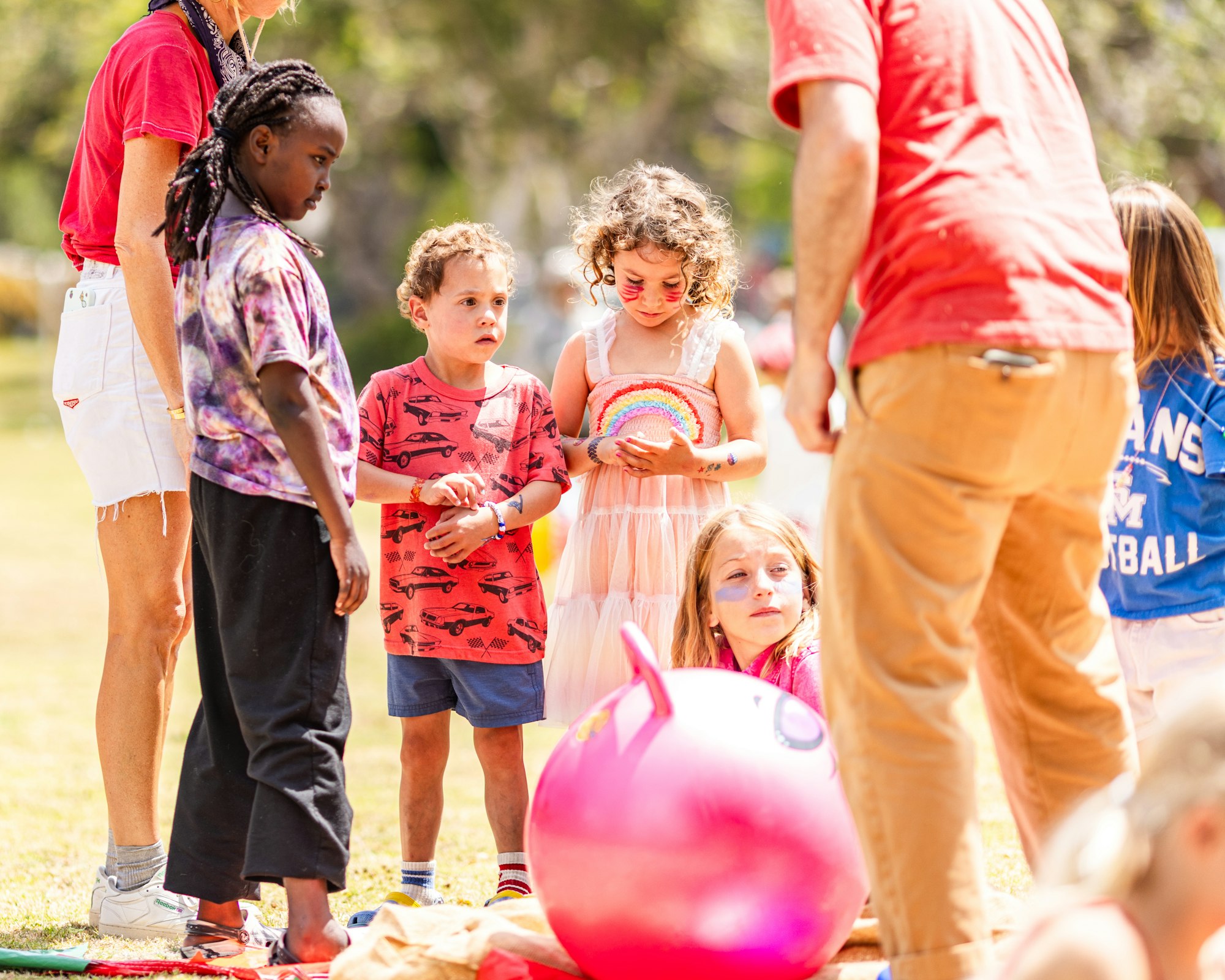 May contain: people, person, boy, child, male, adult, man, clothing, shorts, face, and head