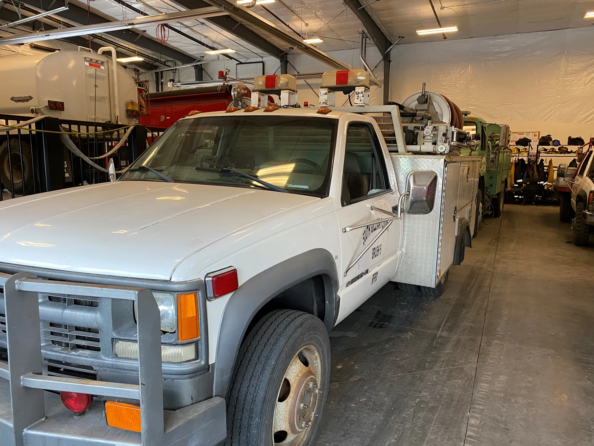 Photo of a white truck, fire support