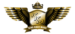 Gold and black logo with wings, crown, and shield design, featuring the text "King Krav Maga" and initials "KKM".