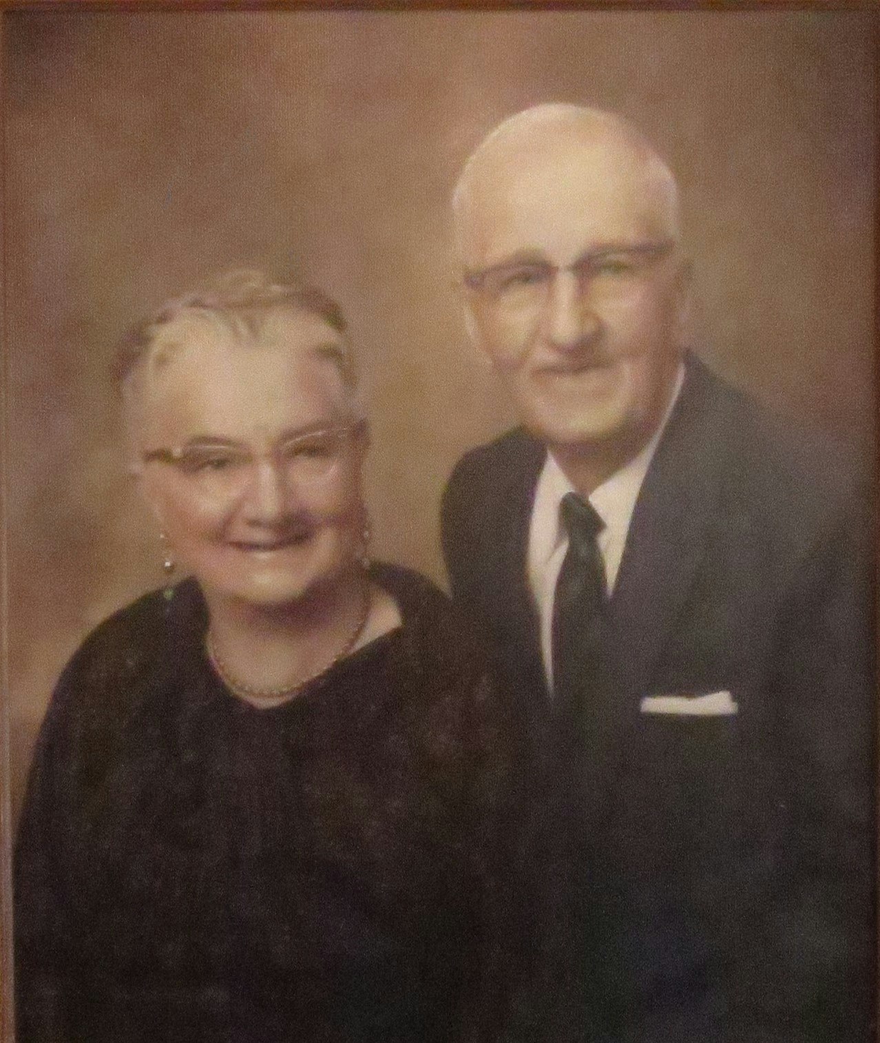 May contain: human, person, apparel, clothing, accessory, accessories, tie, coat, suit, overcoat, and face