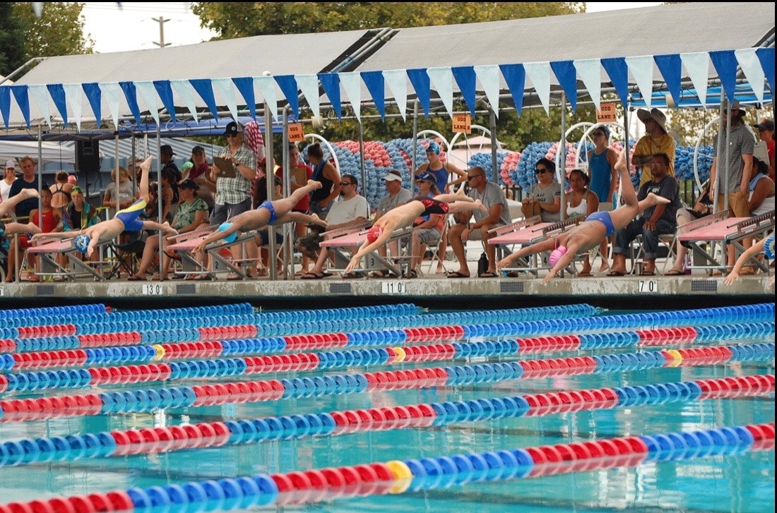 May contain: water, swimming, sport, person, human, sports, pool, clothing, and apparel