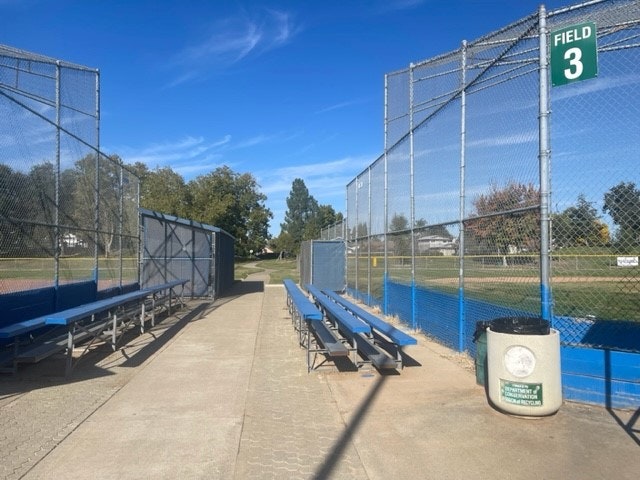 May contain: dugout, sport, people, and person