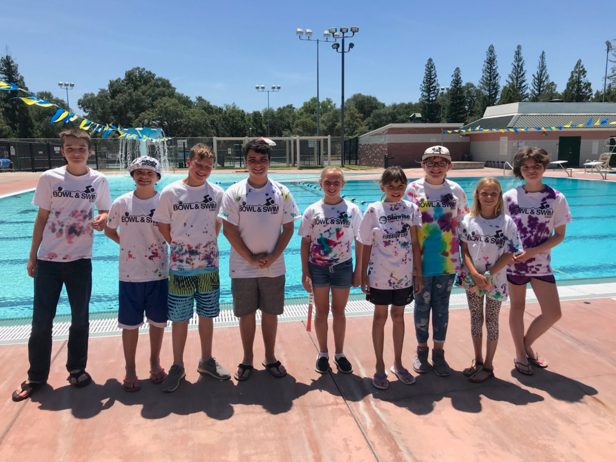 Bowl and Swim Campers in their shirts at the Rusch Pool