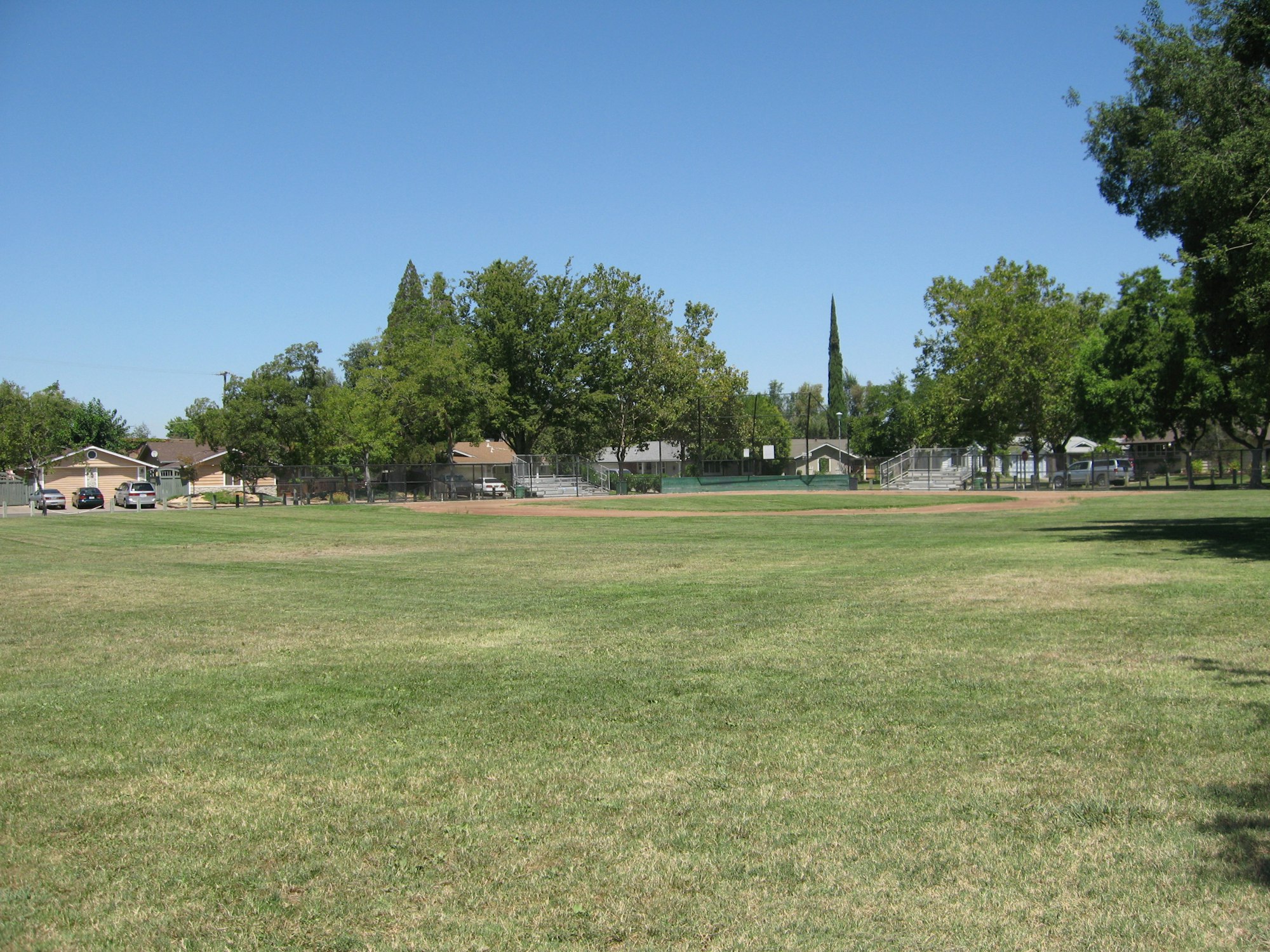May contain: pioneer park, grass, plant, field, nature, outdoors, car, transportation, vehicle, lawn, and park