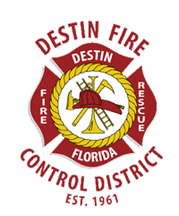 Destin Fire Control District logo with fire helmet, ax, ladder, trumpet, and text "Destin, Florida, Fire Rescue" and "Est. 1961".