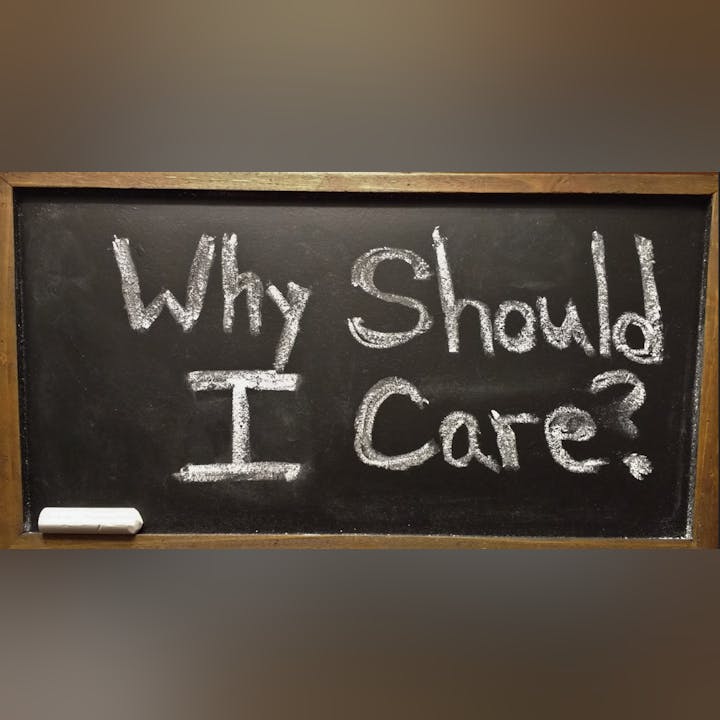 Text on a chalkboard reads: "Why Should I Care?" with a piece of chalk beneath.