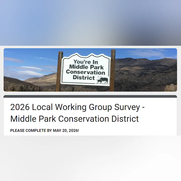 A sign indicating the Middle Park Conservation District and a survey request due by May 20, 2026.
