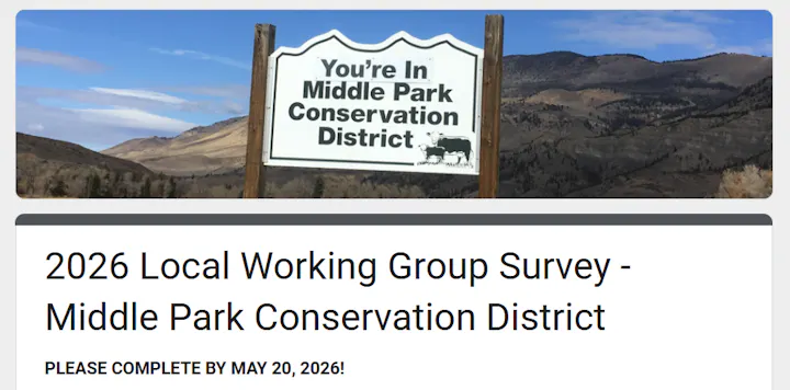 A sign indicating the Middle Park Conservation District and a survey request due by May 20, 2026.