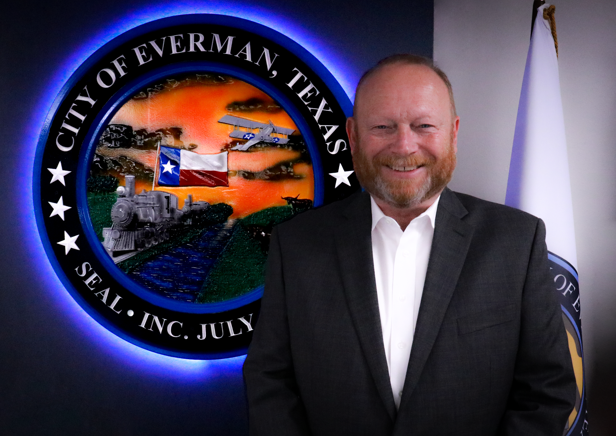 May contain: logo, adult, male, man, person, badge, symbol, people, face, head, and emblem